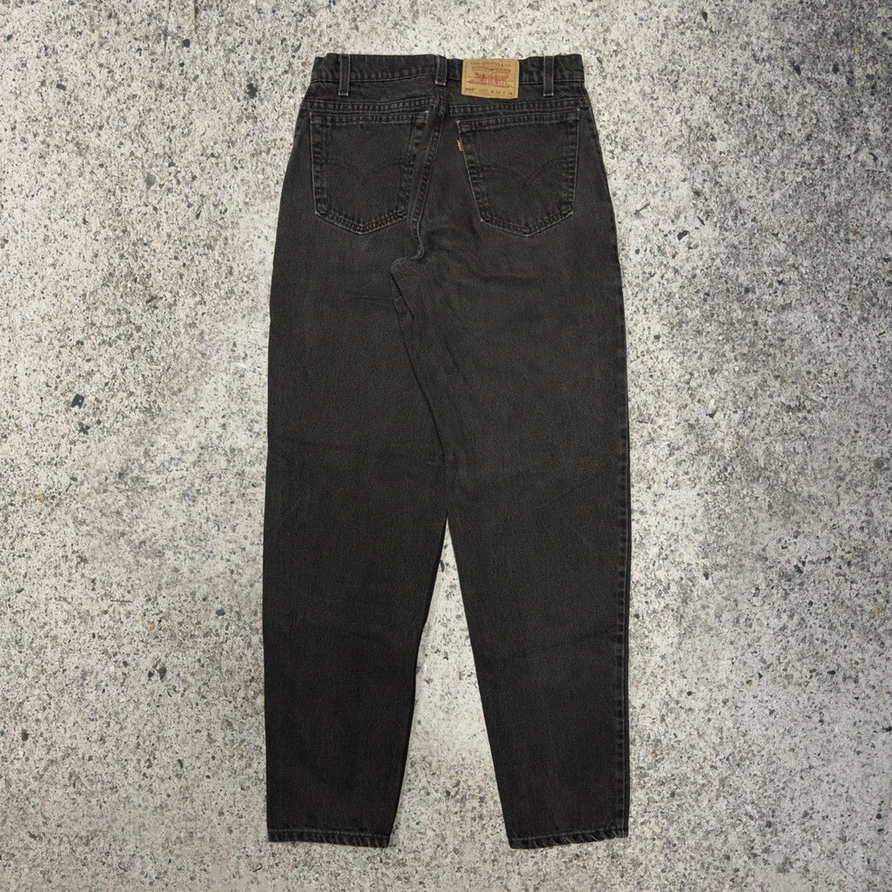 Vaqueros Levi's 560 de corte holgado y cónico en negro descolorido, años 90