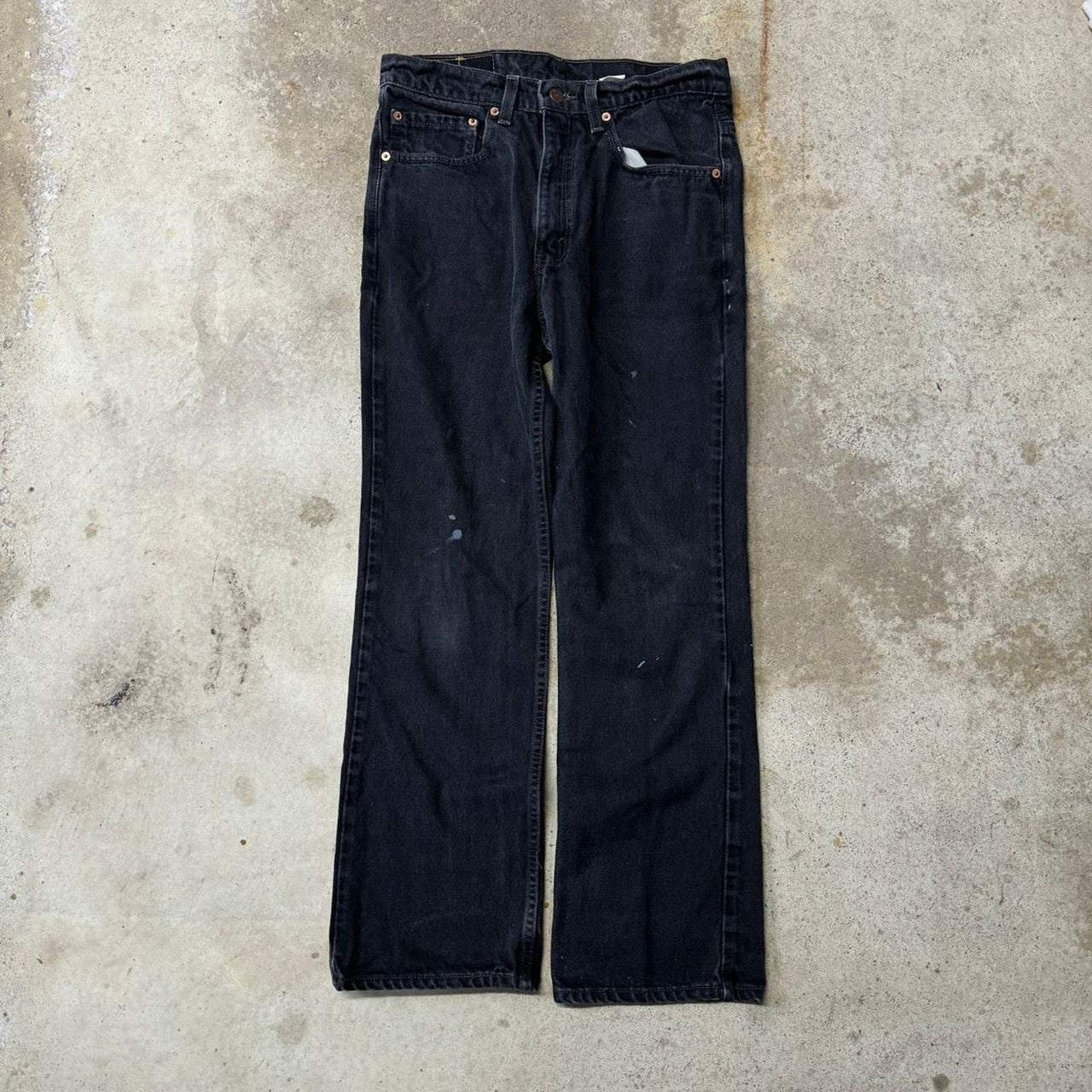 Vaqueros acampanados Levi's 517 negros descoloridos con corte de bota, de los años 90