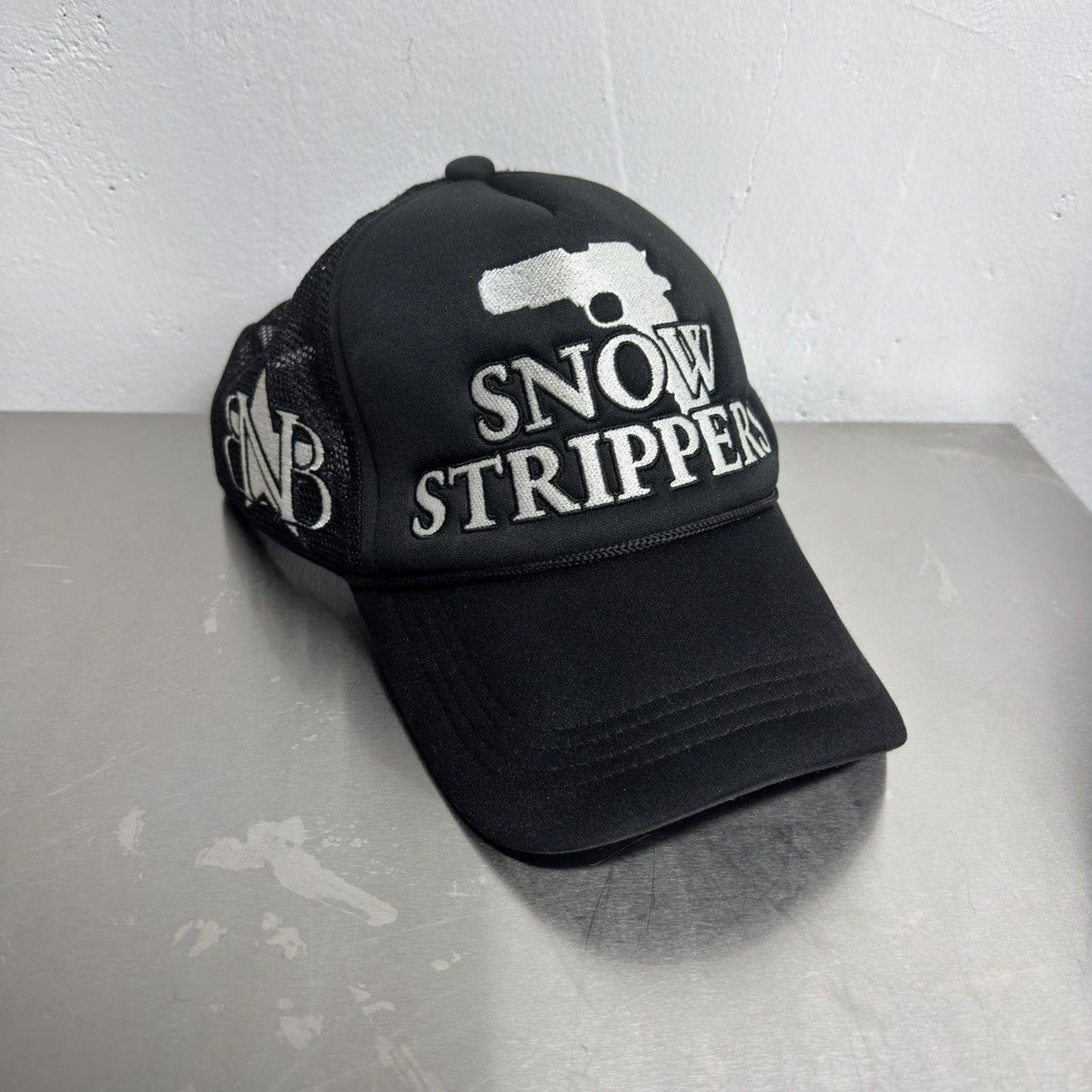 Snow Strippers Gun Embroidered Trucker Hat
