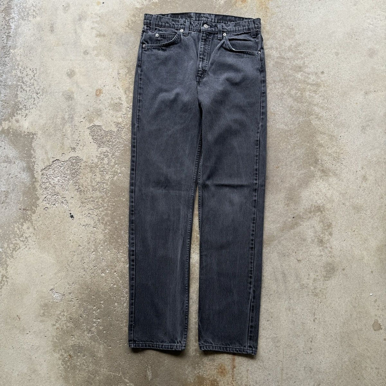 Vaqueros Levi's 505 con lengüeta naranja y negro descolorido de los años 90