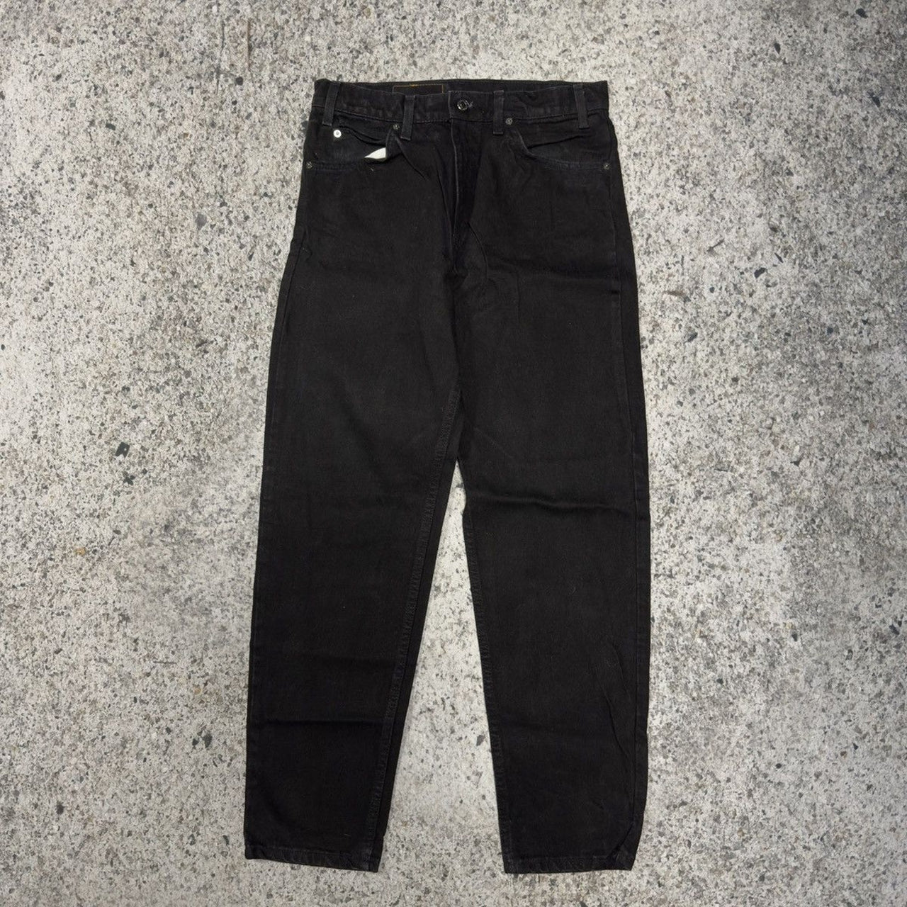 Vaqueros Levi's 550 negros holgados y cónicos de la década de 1990, fabricados en EE. UU.