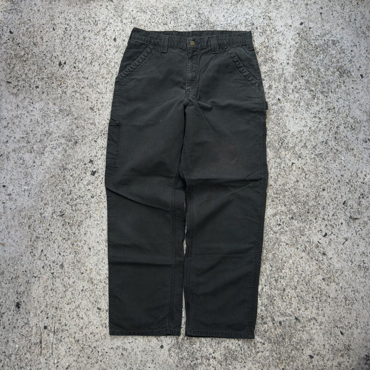 Pantalones de carpintero holgados de lona negra descolorida Carhartt de la década de 2000