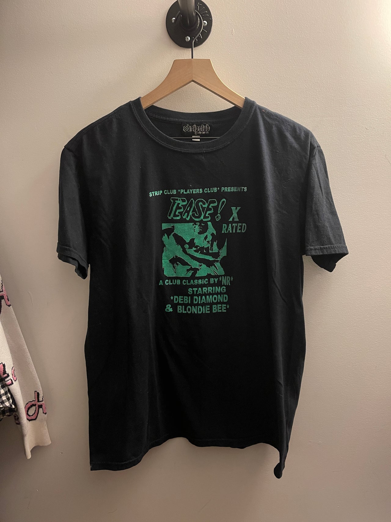 CAMISETA DE NUEVA YORK CON CALIFICACIÓN X DE CLUB DE STRIP DE LOS AÑOS 2000