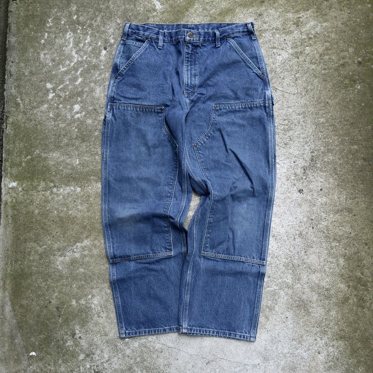 Pantalones Carhartt de mezclilla descolorida con doble rodilla de la década de 2000