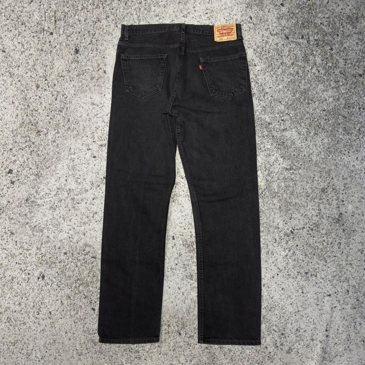 Vaqueros Levi's 505 negros descoloridos de la década de 2000