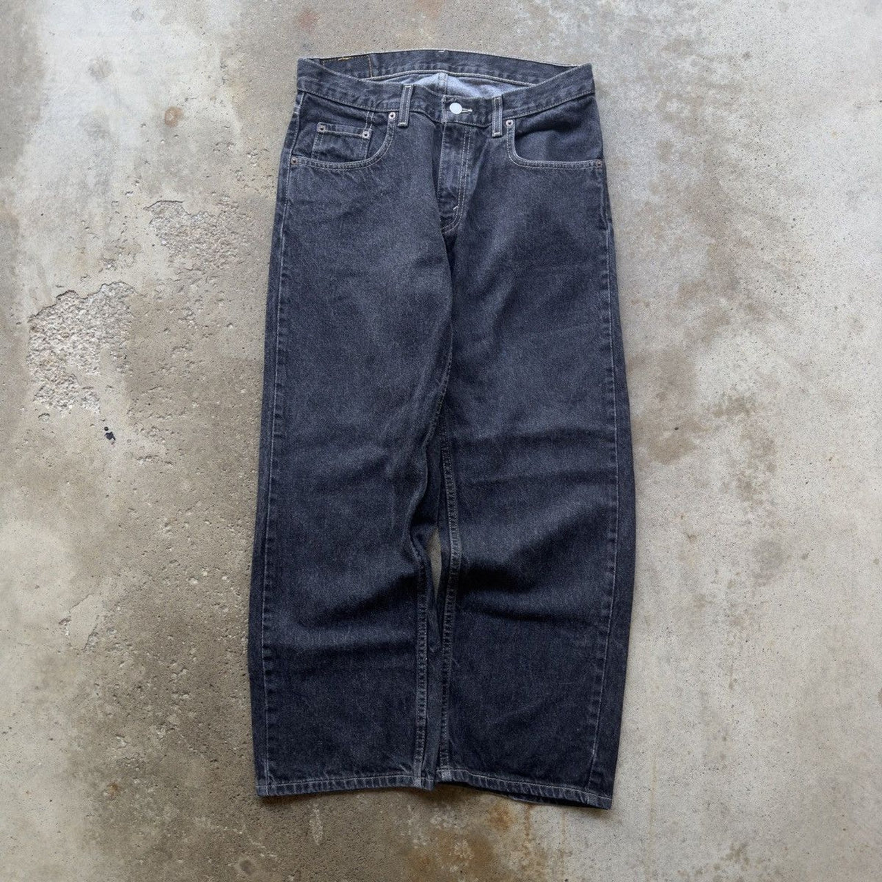Vaqueros holgados de mezclilla negra Levi's 569 de los años 90
