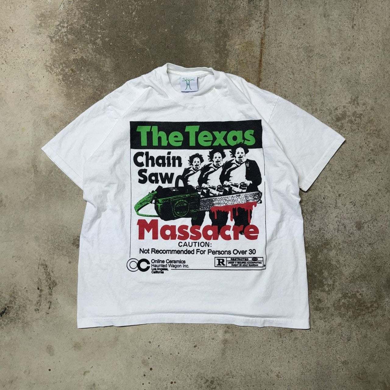 オンラインセラミックス テキサス・チェーンソー・マサカー Tシャツ
