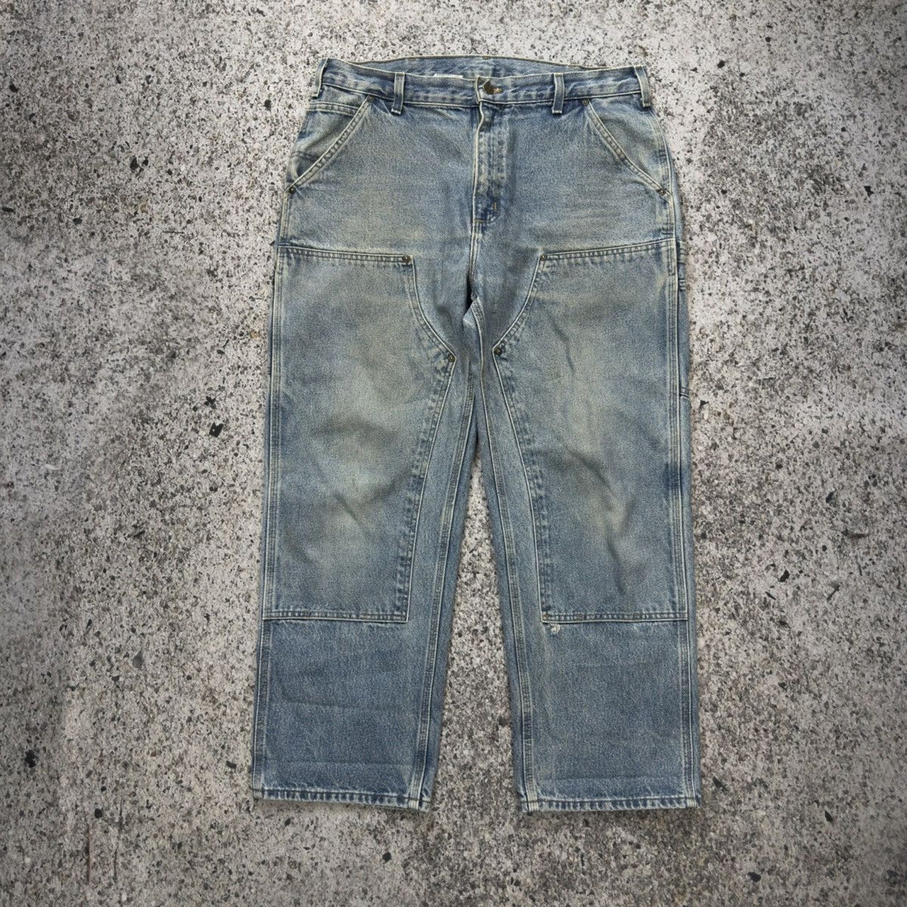 Pantalones vaqueros Carhartt de mezclilla descolorida con doble rodilla de la década de 2000