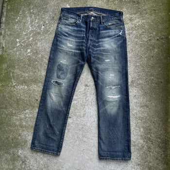JEANS DE DENIM DESGASTADOS Y REPARADOS CON ORILLO DE POLO RALPH LAUREN