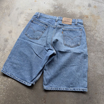 1990s LEVI’S 550 ORANGE TAB LIGHT WASH BAGGY DENIM JEAN SHORTS JORTS