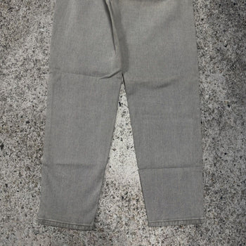 Vaqueros cónicos Levi's 560 de color gris descolorido de los años 90