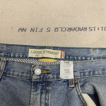 Vintage 2000s Levi's 569 Faded Distressed Baggy Denim Shorts