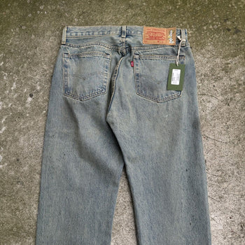 DENIM TEARS LEVI’S 501 DIRTY WASH DENIM JEANS