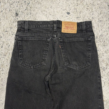 Vaqueros cónicos relajados Levi's 550 Faded Black de los años 90