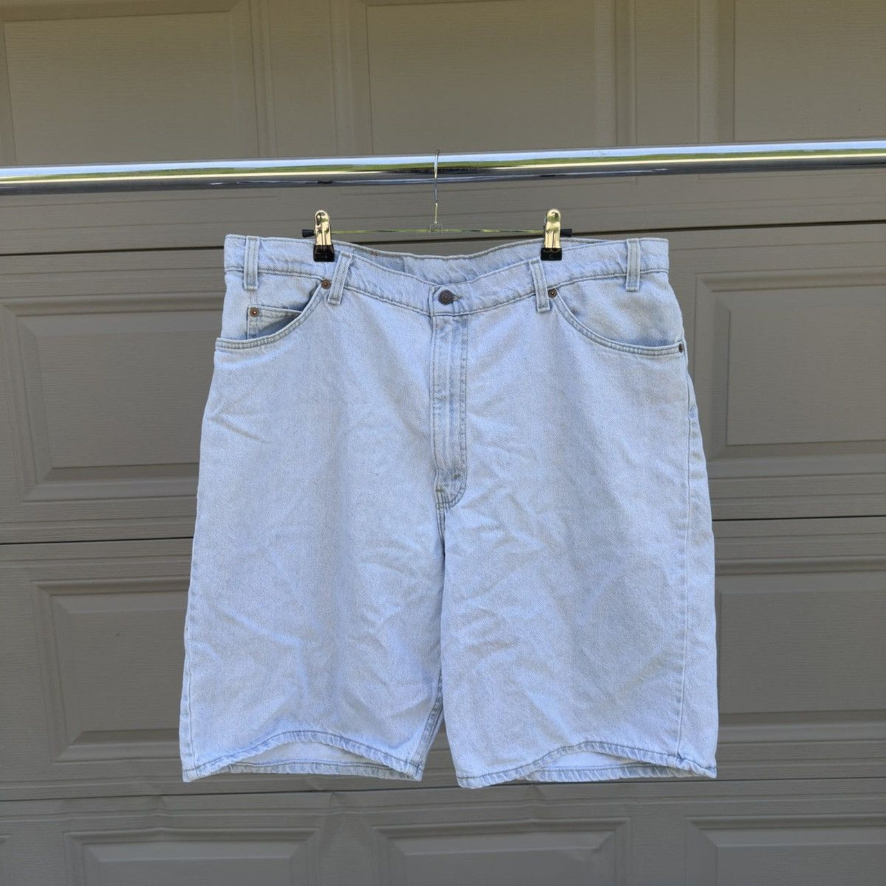 1990s Levi's 550 Orange Tab Light Wash Faded Denim Shorts