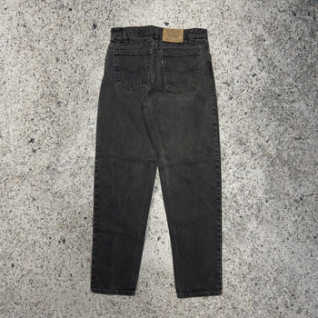 Vaqueros Levi's 550 negros descoloridos de la década de 1990