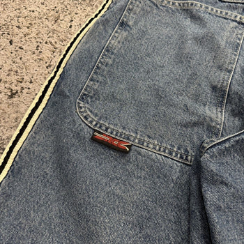Pantalones cortos vaqueros Jnco de pierna ancha y holgados con rayas Skunk de los años 90