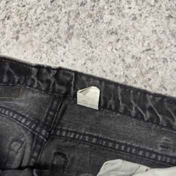 1990s Levi’s 550 Relaxed Tapered Faded Black Jeans
