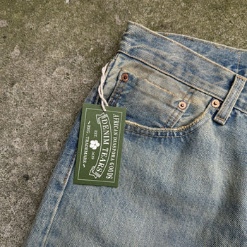 DENIM TEARS LEVI’S 501 DIRTY WASH DENIM JEANS