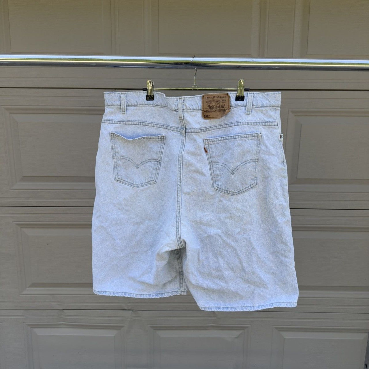 1990s Levi's 550 Orange Tab Light Wash Faded Denim Shorts