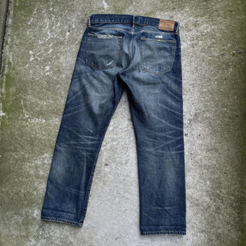 JEANS DE DENIM DESGASTADOS Y REPARADOS CON ORILLO DE POLO RALPH LAUREN