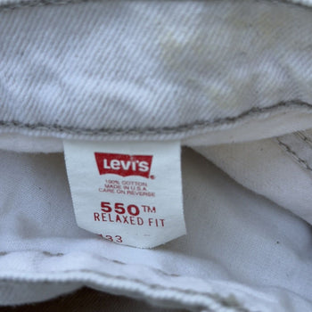 1990s Levi's 550 Orange Tab White Denim Shorts