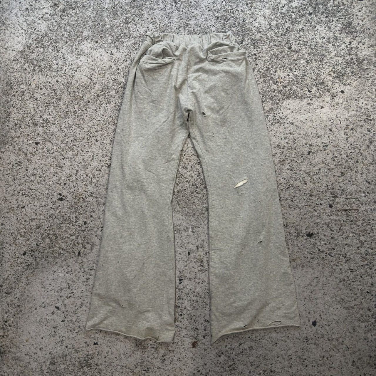 Pantalones deportivos acampanados y desgastados de Dasyori