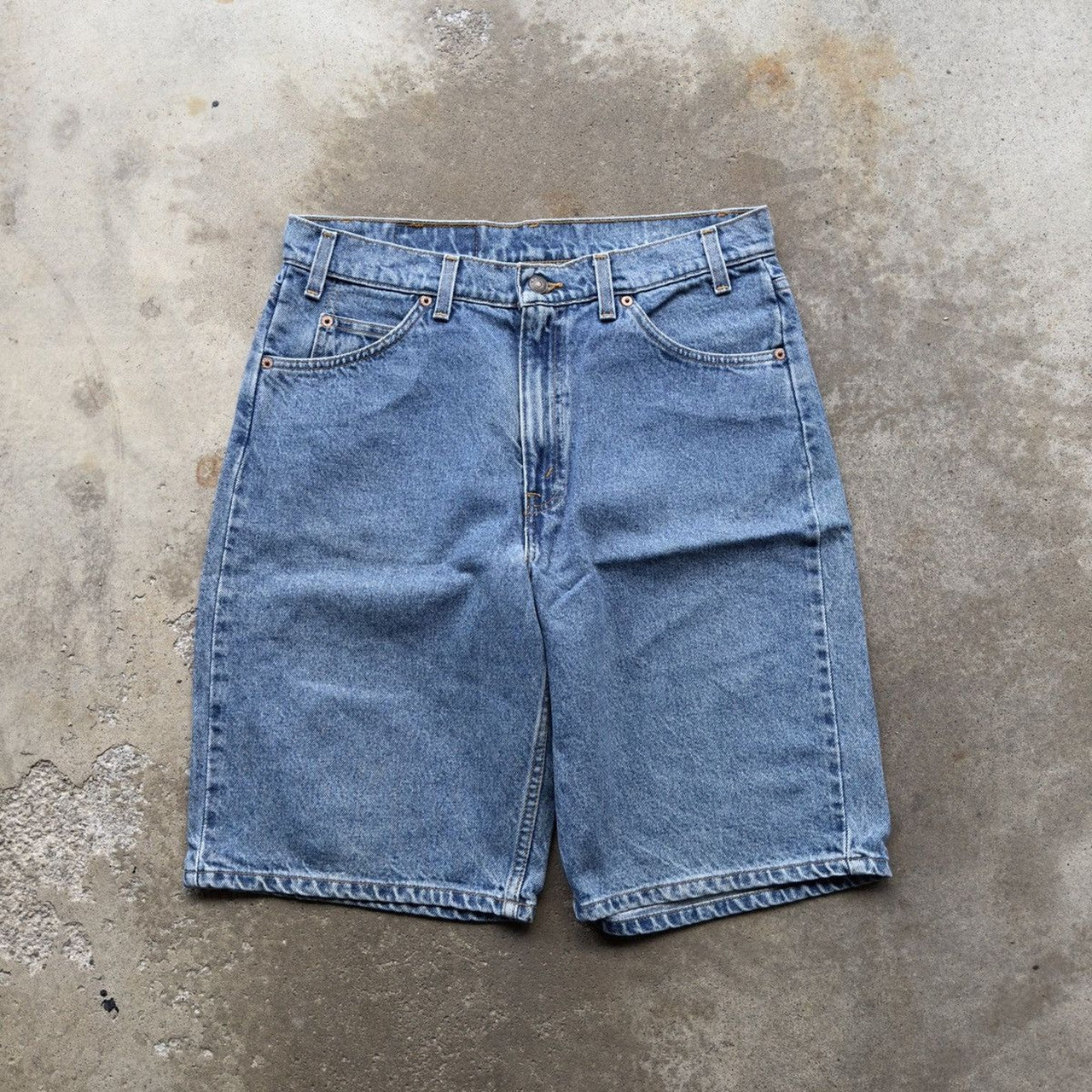 1990s LEVI’S 550 ORANGE TAB LIGHT WASH BAGGY DENIM JEAN SHORTS JORTS