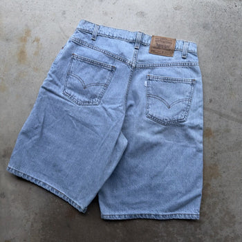 1990s LEVI’S 560 BAGGY LIGHT WASH DENIM JEAN SHORTS JORTS