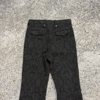 Pantalones acampanados con estampado de piel de serpiente de lana de Dries Van Noten
