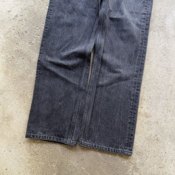 1990s LEVI’S 501 BLACK FADED DENIM JEANS MADE IN USA