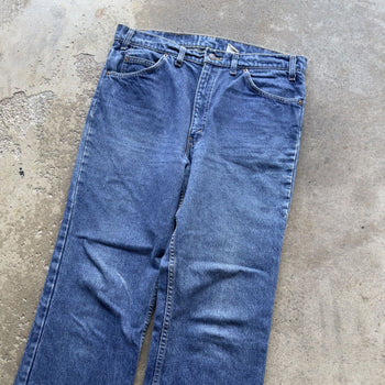 1990s LEVI'S 517 ORANGE TAB MADE IN USA BOOT CUT FADED DENIM JEANS