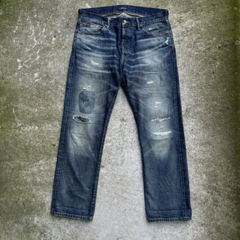 JEANS DE DENIM DESGASTADOS Y REPARADOS CON ORILLO DE POLO RALPH LAUREN