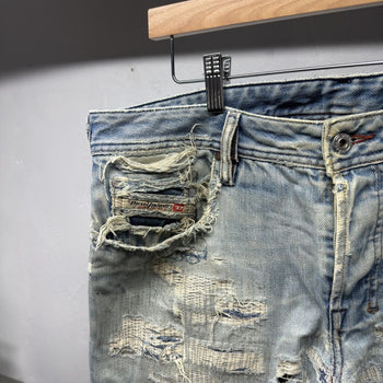 Diesel Thrashed Faded Distressed Repaired Jeans