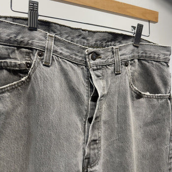 Vintage 1980s Levi's 501 Made in USA Faded Distressed Grey Jeans