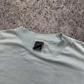 Camiseta de bolsillo de Fórmula 1 descolorida de los años 80
