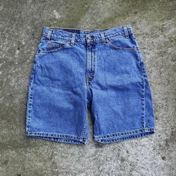 1990s LEVI'S 550 FADED LIGHT WASH DENIM SHORTS WHITE TAB