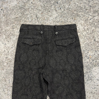 Pantalones acampanados con estampado de piel de serpiente de lana de Dries Van Noten