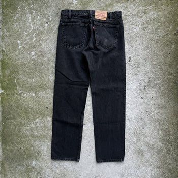 1990s LEVI'S 505 MADE IN USA BLACK FADED DENIM JEANS