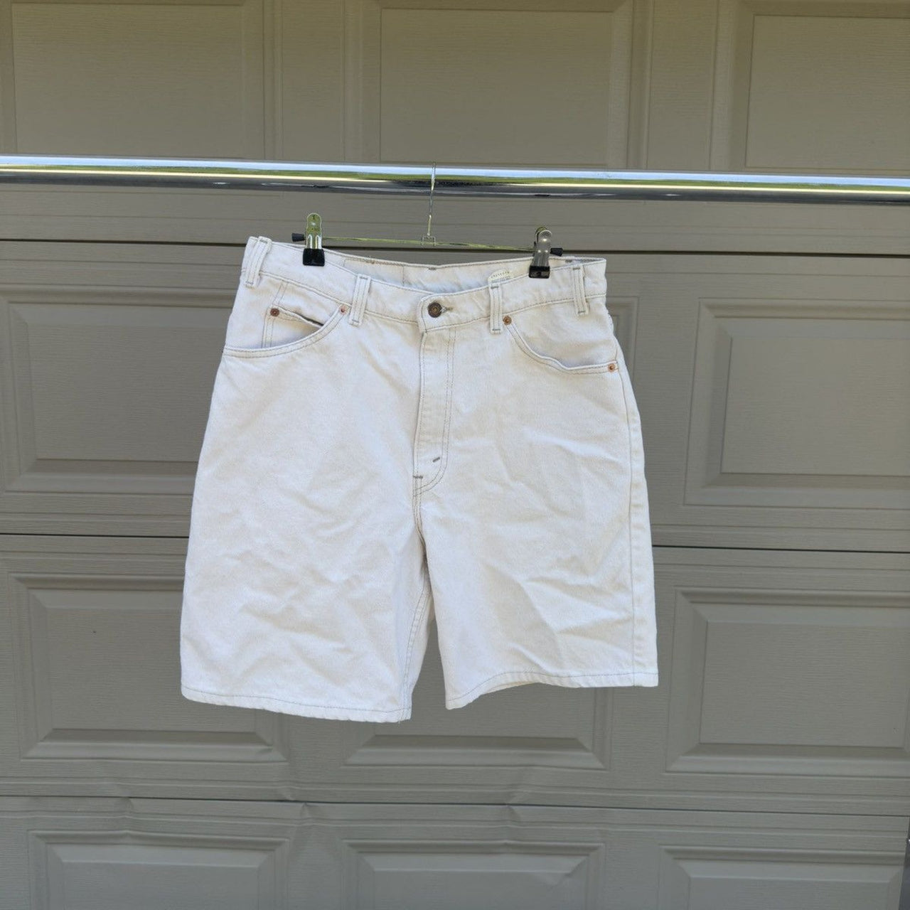 1990s Levi's 550 Orange Tab White Denim Shorts