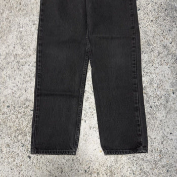 Vaqueros Levi's 550 con lengüeta naranja y negro descolorido de los años 90