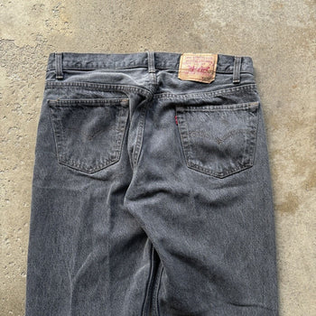 1990s LEVI’S 501 FADED BLACK DENIM JEANS MADE IN USA