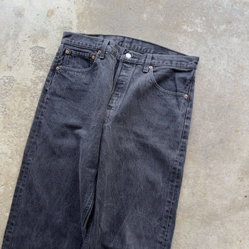 1990s LEVI’S 501 BLACK FADED DENIM JEANS MADE IN USA