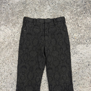 Pantalones acampanados con estampado de piel de serpiente de lana de Dries Van Noten