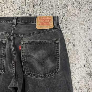 1990s LEVI'S 501 BLACK FADED THRASHED DENIM JEANS