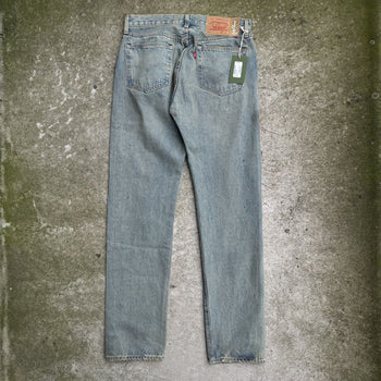 DENIM TEARS LEVI’S 501 DIRTY WASH DENIM JEANS