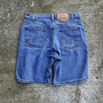 1990s LEVI'S 550 FADED LIGHT WASH DENIM SHORTS WHITE TAB