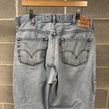 2000s Levi's 560 Baggy Thrashed Faded Jeans