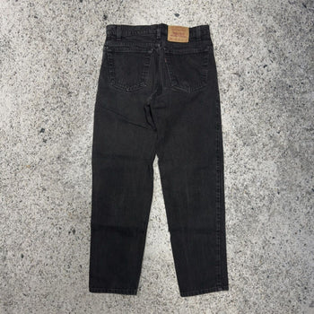 Vaqueros cónicos relajados Levi's 550 Faded Black de los años 90