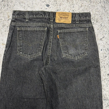 1990s Levi’s 550 Orange Tab Faded Black Denim Jeans